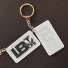 3D printed logo keychain in full color, highlighting a sleek and modern font on the front. Perfect for promotional gifts and company branding.