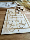 Pregnancy announcement puzzle made from 3mm thick wood, measuring 10.5 x 14.8 cm. A fun and memorable keepsake for grandparent reveals or baby announcements, with fully customizable engraving.